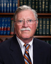 Headshot of retired attorney Charles T. Herndon IV